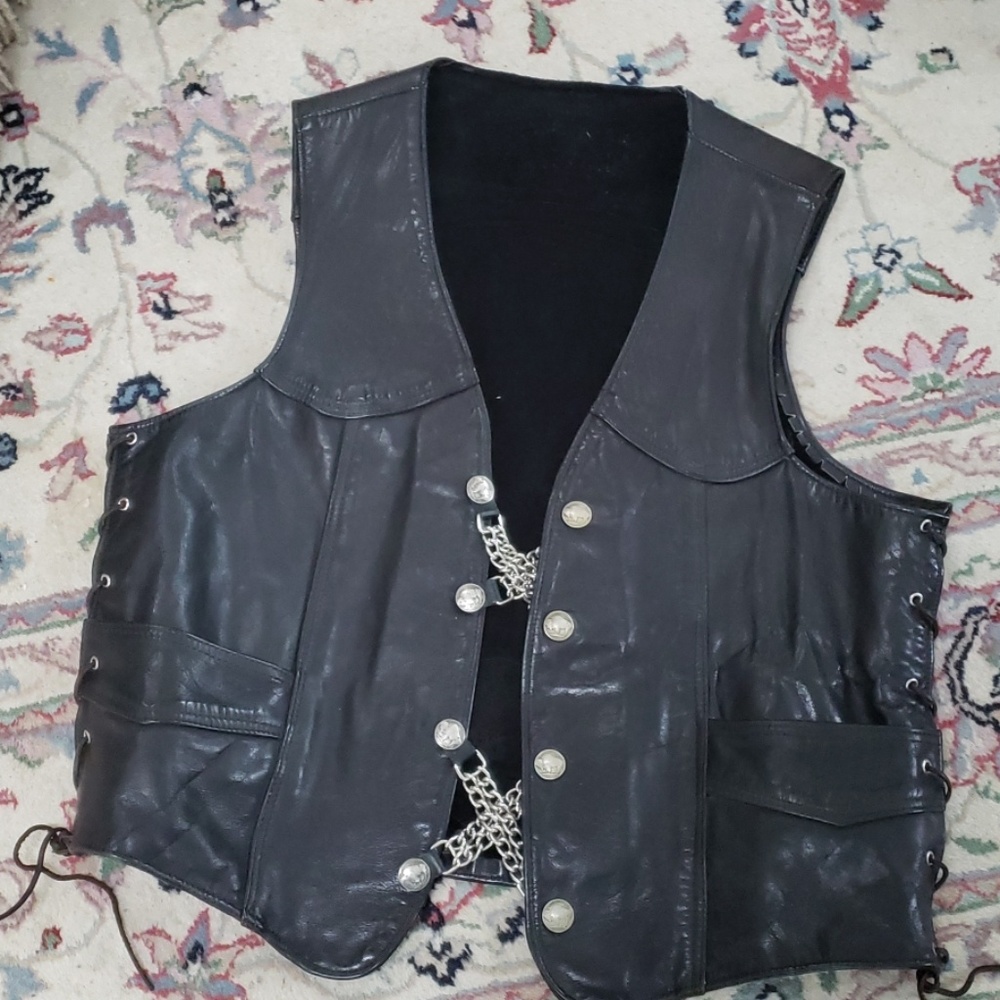 Motorcycle vest with Harley Davidson patch.